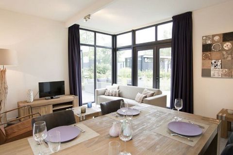 This modern, detached holiday home is located in the small-scale holiday park Resort Bad Meersee, only 3 km from the beautiful North Sea beach of Nieuwvliet-Bad. This single-storey holiday home is furnished in a modern and comfortable way. The spacio...