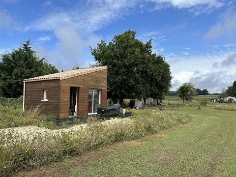 Summary Tiny house situated in a quiet location at Montlieu La Garde. This house is situated on a plot of building land 2400m2, it is an ideal base for you to live in whilst building the house of your dreams. The wooden construction house has double ...