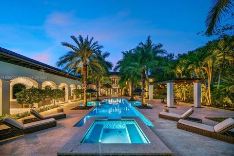 This magnificent 12,294 Sq. Ft. residence on a one-acre corner lot in north Pinecrest features beautiful living areas, an elegant living room and formal dining room, 6 bedrooms and 8.5 baths. The chef's kitchen is complete with a butler's pantry, mar...