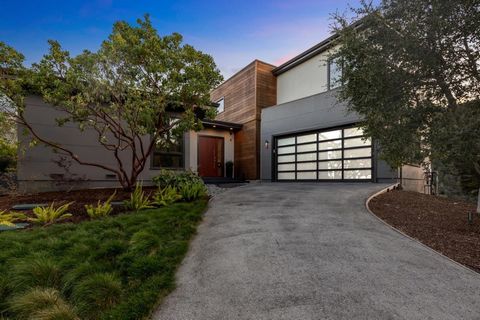 Modern living is at its finest is a short 7-minute drive from 280 to this stunning hilltop contemporary with its open, flowing floorplan featuring multiple spaces for living, working, and entertaining. Enjoy ultimate privacy and striking views from n...