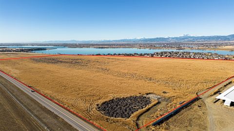 This vacant 110 +/- acre piece of land consists of 4 parcels with Boyd Lake Avenue frontage directly across from the Northern Colorado Regional Airport. Two parcels zoned 19.5 acres for Business Development. The other two parcels consisting of 90.75 ...