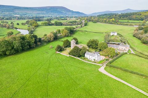 The Old Rectory, as the name implies, is the former rectory for the neighbouring St Cadocs Church which lies behind the house. The house is situated in a peaceful corner of a popular village located between Abergavenny and Monmouth. Steeped in histor...