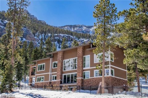 IMAGINE A GATED RIDGES STYLE CUSTOM CONTEMPORARY DESIGNED HOME. TRANSPORT THAT INTO THE TRANQUILITY OF MOUNTAIN AIR, SNOW COVERED PEAKS AND A FOREST OF PINE TREES. NOW YOU HAVE THE OPPORTUNITY TO EXPERIENCE AND LIVE IN MOUNT CHARLESTON WITH ALL THE M...