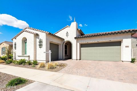 Stunning Shire floorplan that shows and feels like a model home. The dramatic entry leads to a large great room with glass walls looking out to your private backyard. The gourmet kitchen boasts a massive island with upgraded appliances, walk in pantr...