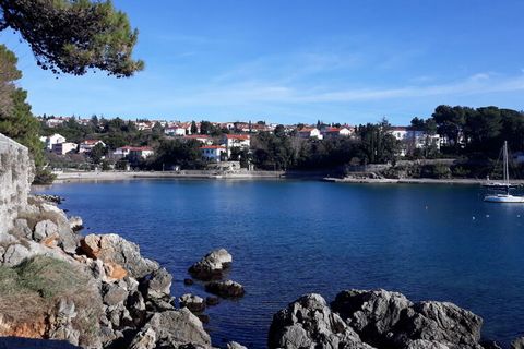 Welcome to the island of Krk. We offer several studio apartment for 2 people with an extra bed. Our house is located above the beach and offers a wonderful view of the sea and a fantastic view of the old town of Krk. The house is surrounded by a beau...