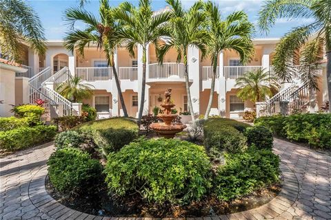 Welcome to coastal living located in the heart of Palmer Ranch! This inviting condo at Plaza De Flores offers a full water view, complete with fountain, as you enjoy your screened-in lanai. The Oleander split floor plan keeps your primary suite separ...
