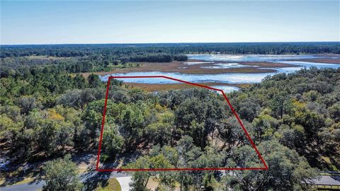 Build your dream home on this beautiful slice of Florida in the gated community of Clearwater Reserve. This 4.3 acre lot has direct access to the lake and is surrounded by protected wetlands. The Florida turnpike, shopping, parks, lakes and much more...
