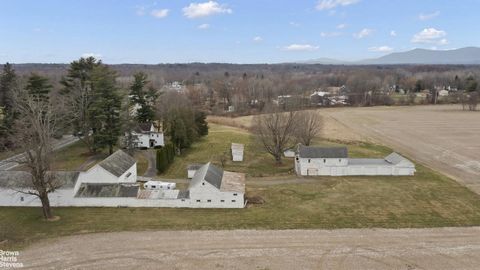 UNIQUE OPPORTUNITY - HISTORIC HOME - BARN COMPLEX and APARTMENT - HIGH VISABILITY FOR YOUR DREAM - Attention creators, lovers of antique homes and barns, and history buffs: Embrace a unique opportunity with this rare find-a fusion of history and pote...