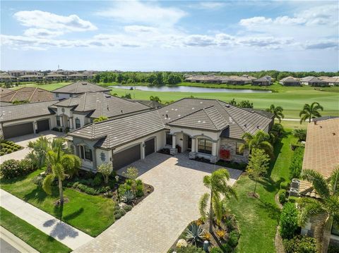 Indulge in the luxury lifestyle offered by this exquisite Napoli model 4-bed, 2.5-bath 3-car garage pool home, located in sought-after Lakewood National, a gated golf course community. Situated on an unparalleled lot on the only cul-de-sac in the ent...