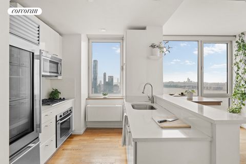 Step foot into this stunning and sun drenched two bedroom with two full bathrooms at the Atelier Condominium. Apartment 42K obtains tremendous amount of natural light and has some of the best views in all of NYC! Clear and open views of the Hudson Ri...