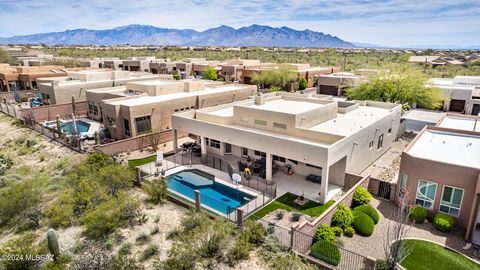 Open house this Saturday 2-4 pm and Sunday 1-4 pm. Fabulous gated Preserve II at Dove Mountain boasts acres of open space with spectacular mountain and desert views. Built by Insight Homes one of the most sought after area builders. Gated custom cour...