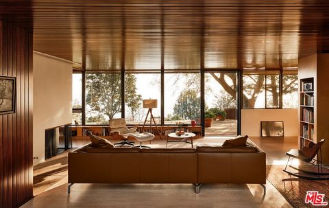 Presenting the Coe House by Richard Neutra. Perfectly sited on over an acre in the prestigious 24-hour guard-gated city of Rolling Hills, this exemplary embodiment of mid-century modern architecture overlooks the Palos Verdes Peninsula with unobstruc...