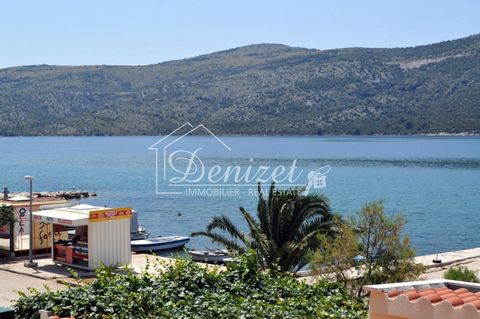 Ideal investment! House with 10 apartments + 1 commercial space (cafe bar ). Ideally located: first row by the sea, in a small village preserved from big crowd. Only 10 km from Trogir and 15 km from the international airport of Split. House surface o...