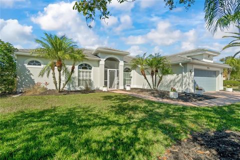 Live with sunset splendor in this recently updated interior and large corner lot lakeview home, located in the gated community of Laurel Lakes. Evening sunsets await you in this stunning three-bedroom with separate den, two-bathroom pool home. Relax ...