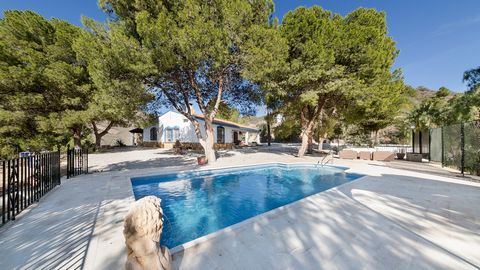 This breathtaking 5-hectare (12.45 acres) finca nestled in the hills of Águilas boasts two charming houses. The main house, a detached cortijo of 2,260 square feet (210 m²), combines modern comfort with delightful Spanish details. It features three b...