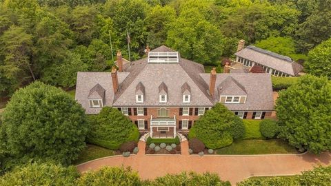 This magnificent estate is situated 3.14 acres of lush land & offers 5 beds/6 baths, & 2 three stall garages w/auto lift for the car enthusiast. The foyer w/curved staircase creates a dramatic entrance and leads to a loft area w/custom built-ins. The...