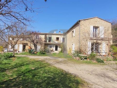 GRIGNAN Mas de caractère located in Grignan in a privileged environment with a superb view of the castle. This property comprises 4 independent dwellings. You'll love this haven of peace with its 1.7ha wooded plot, and this charming, authentic buildi...