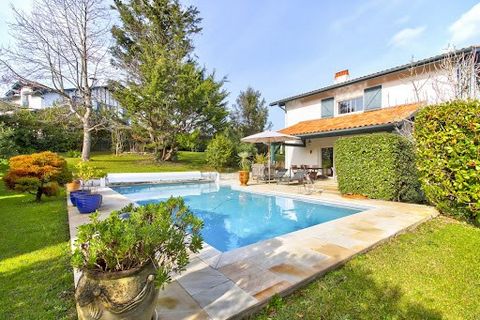 Large neo-Basque house pleasant to live in of more than 200 m2 composed of 5 bedrooms, beautiful living room with fireplace opening onto large terrace of 150 m2 with swimming pool facing South! Garage, parking spaces, veranda, terrace, laundry room, ...