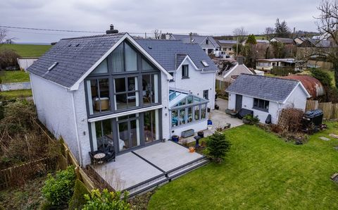 Fine & Country West Wales is delighted to present this stunning, architecturally designed detached residence, nestled in the picturesque village of Bancyffordd, near Llandysul. Offering an exceptional blend of contemporary elegance and countryside ch...