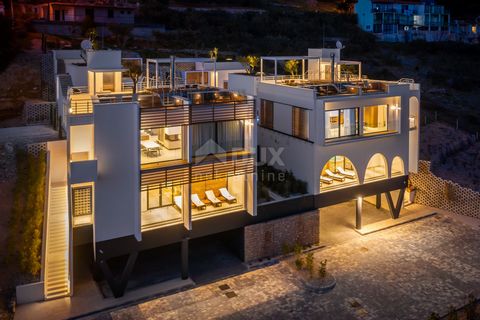 Location: Splitsko-dalmatinska županija, Omiš, Marušići. OMIŠ - Luxury villa with a panoramic view The villa extends to 297m2 and consists of a ground floor, two floors and a roof terrace of 93m2 where the summer kitchen is located with all the accom...
