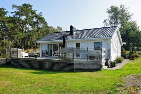 A newly renovated and modern holiday home in a small cottage area. The cottage is located high with a secluded, rural and quiet location. Horses walk in the pastures and the sea is visible from the cottage. A small secluded beach is within walking or...