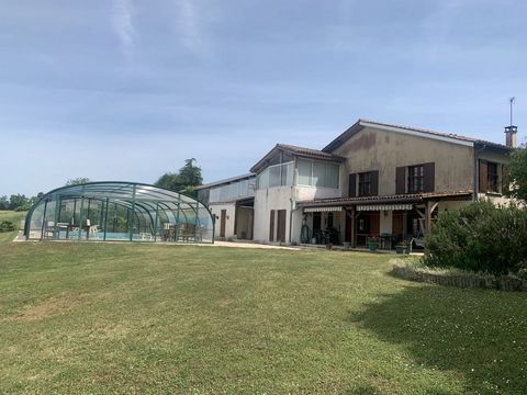 A deceptively spacious 5 bedroom, 4 bathroom detached Charentaise house with potential to divide into 2 separate dwellings. Comes with a covered in ground swimming pool and a number of outbuildings. All set in over 11.3 Hectares of rolling countrysid...