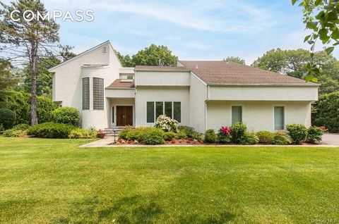 Privacy, space and light abound in this dramatic contemporary set on an especially beautiful property. The grounds boast mature trees and flowering plantings, and the flat, spacious backyard abuts beloved Leatherstocking Trail offering year-round tra...