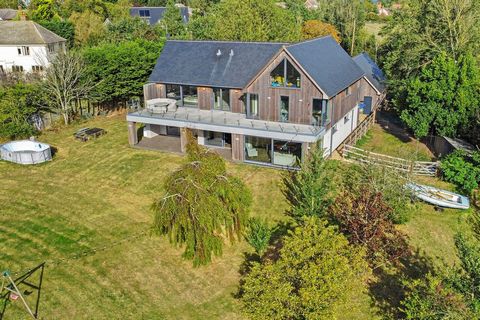 THE PROPERTY Nestled in the tranquil countryside of Peldon, this exceptional four-bedroom detached contemporary home provides a luxurious living experience. Spanning an impressive 5,390 square feet, every aspect of this property has been meticulously...