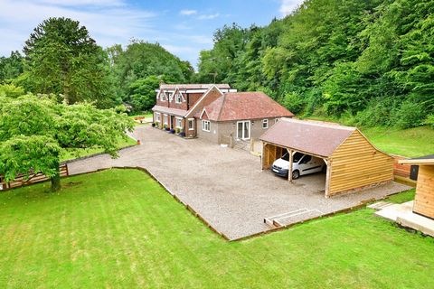 Nestling among 1.86 acres of gardens, woodland and a paddock in an Area of Outstanding Natural Beauty stands the delightfully named Pleasant Acres. It is surrounded by farmland and in an elevated position providing wonderful views of the surrounding ...