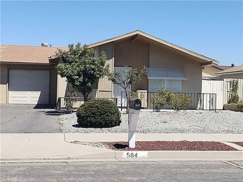 Lovely Duplex in a 55+ community of Valle Hermosa! Features include 2 bedrooms (with sliders to the back yard), 2 baths with tile flooring/walls, single car attached garage with washer/dryer hook-ups, spacious kitchen (includes stainless steel refrig...