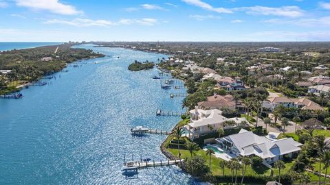 Tiffany Lane is a piece of paradise perched on a half-acre of elevated waterfront property within the coveted gated community of Rolling Hills. This boaters dream boasts over 100ft of deep waterfront and includes a dock, heavy lift and additional sli...