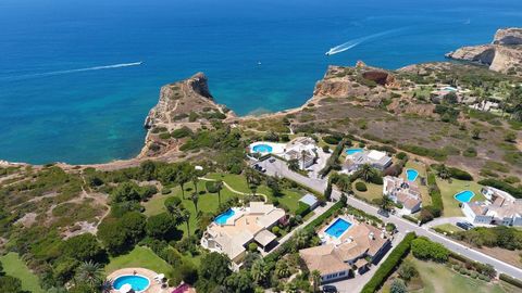 Located in Lagoa. Spectacular Cliff-Top Villa with Breathtaking Sea Views in West Algarve. Prepare to be captivated by the unparalleled beauty of this unique property, perched majestically on a cliff top in the charming village of Carvoeiro. With fro...