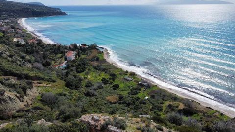 Located in Lourdata. This unique and premium sea-front plot comes with building permission for a property up to 275m². With uninterrupted sea & mountain views, this beautiful and very well located plot of 9.300m² is situated up in the hills behind Lo...