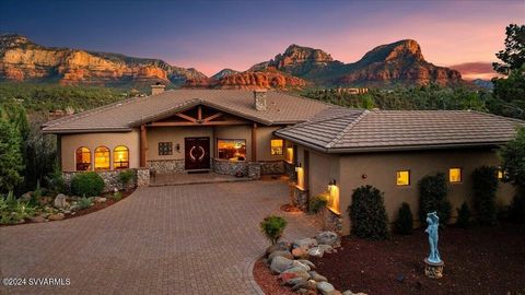 This home is the quintessential property of Sedona living. Extraordinarily successful luxury vacation rental comes turnkey and fully furnished. 5,000 sq ft living space, 1500 sq ft covered patios and 1200 sq ft open flagstone patio with 5 Bedrooms, 3...