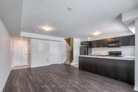 Stunning 2-Storey Stacked Townhome. Spacious Living Space With An Open Concept Modern Kitchen, Breakfast Bar And Walk Out Balcony Overlooking Green Space. Enjoy Your Own Private 300 Sqft Rooftop Terrace And More. 2nd-Floor Laundry, Minutes Walking To...