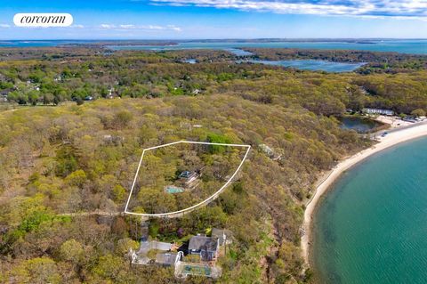 This exquisite mid-century modern is located in the Heights area of Shelter Island. Main house features an open living concept floor plan. Multiple windows and French doors lead out to the decking that surrounds the house on both the main floor and s...