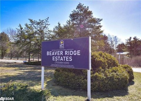 This well maintained unit located in Sunpark Beaver Ridge is situated in one of the parks most desired areas. It is at the back of the park overlooking the pond. Perfect view when sitting out on one's side deck after a busy day! This one bedroom, 1 b...
