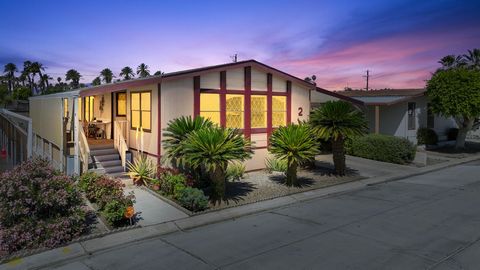 Wonderful 2 bedroom 2 bathroom home in the 55+ gated community of Rancho Casitas Mobile Home Park. The vaulted ceilings and light color palette enhance the space! Great floor plan including a tv room off the kitchen, formal dining room and spacious f...