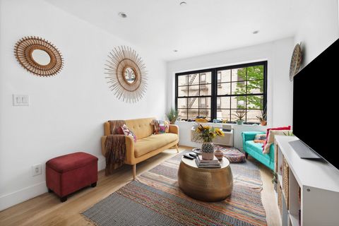 Extremely low carrying costs Modern, bright, and pin-drop quiet, this 2-bedroom, 1-bathroom condo offers dynamic Brooklyn living at the nexus of Bushwick and Bed-Stuy. Chic finishes run throughout the home, including beautiful hardwood floors, oversi...