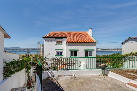Located in Almada. Charming home for sale in Trafaria, just a short 20-minute drive from Lisbon's city center, across the iconic 25 de Abril Bridge. The house is within walking distance of the village center, providing easy access to essential amenit...