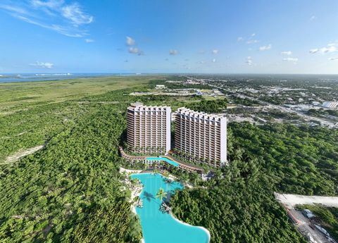 Descubra un oasis de lujo en el corazón de Cancún. Sumérjase en una laguna artificial de 8.000 m² de aguas cristalinas que ofrece un exclusivo oasis tropical para los residentes. Desde relajantes momentos bajo el sol hasta emocionantes actividades ac...
