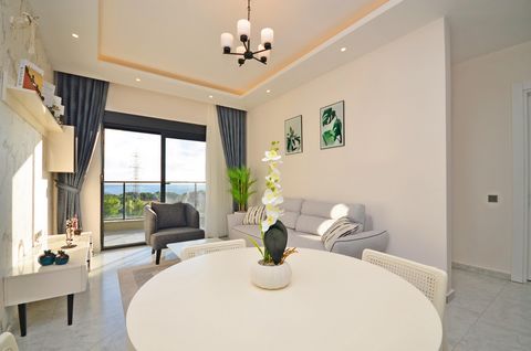 ALANYA/AVSALLAR 750 METER VAN DE ZEE UITZICHT OP ZEE VOLLEDIG LUXE GEMEUBILEERD 1+1,60M2 BINNEN- EN BUITENZWEMBAD-TURKS STOOMBAD-SAUNA-FITNESS-SPEELKAMER-TENNIS- EN BASKETBALVELDEN-KINDERSPEELPLAATS-CAMELIA-GENERATOR-WIFI-BUITEN- EN BINNENPARKEERPLAA...