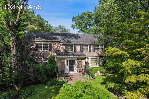 Your spectacular Scarsdale garden retreat awaits in this lovely colonial situated on a secluded acre filled with lush landscaping. This over 4000 square foot updated home delivers a welcoming ambiance throughout the formal living and dining rooms, re...