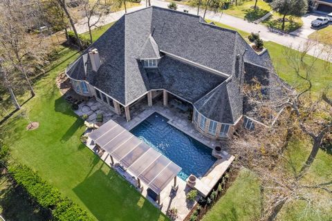 Welcome to this stunning custom home situated on nearly an acre of land, offering both luxury and functionality. With all bedrooms located on the first floor, the layout is ideal for easy living. Upstairs, you'll find a spacious media room and a full...