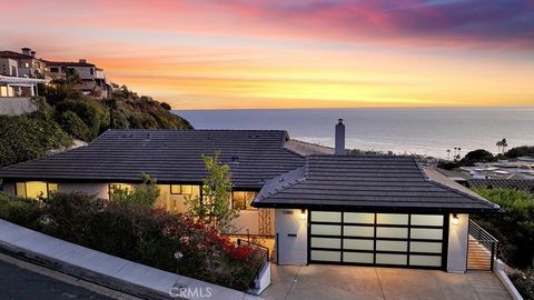 SPECTACULAR and CAPTIVATING UNOBSTRUCTED OCEAN and VALLEY VIEWS! This mid-century modern home sits on a large 9240 square foot lot with a 260 degree ocean, Catalina Sunsets and coastline views. Enjoy the stunning views from living room, dinning room,...