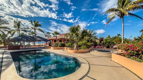 The quintessential Baja beachfront dream home. Enter the welcoming arched electric gates and you enter into the past and the old Baja California Sur before paved roads and gated communities. 2 1 2 acres of total privacy fronting the spectacular white...