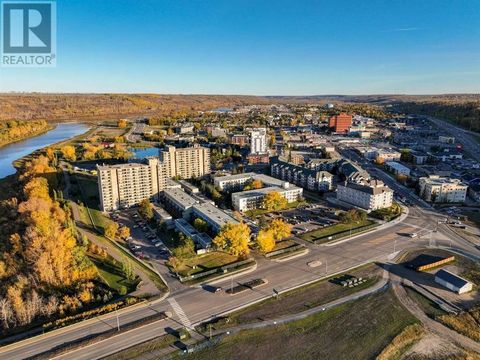 Welcome to 21 MacDonald Dr #1644: Ready for immediate possession, this 2 bed, 1.5 bath 2-storey unit offers splendid views and is an ideal investment opportunity or perfect if you're looking to own your own property. As you step inside, you're greete...