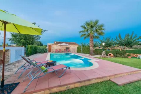 An authentic Mallorcan porch with a built-in barbecue promises memorable evenings accompanied by a tasty dinner and a good bottle of wine, while a second porch, in front of the house, is the perfect place to have breakfast and relax on the sofa conte...