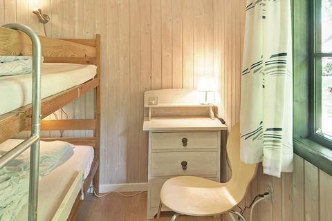 Holiday cottage situated a few metres from the best sandy beach in Denmark. Big living room with flat screen TV, open kitchen area and exit to sheltered terrace with garden furniture. The cottage has all modern facilities. Shared, heated swimming poo...