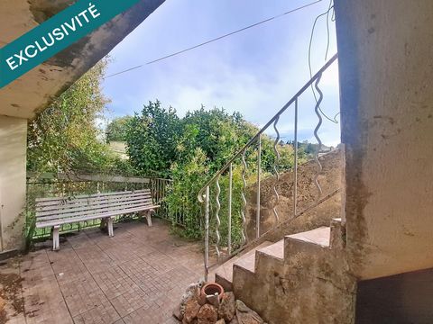 Maison plein centre très lumineuse avec grande baie vitrée sud donnant sur un balcon